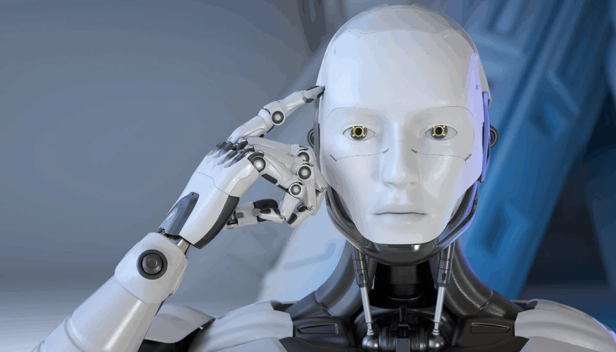 A humanoid robot with one hand raised to its head, as if thinking