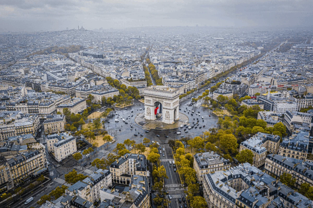 Aerial view of Paris around the Arc de Triomphe in autumn
